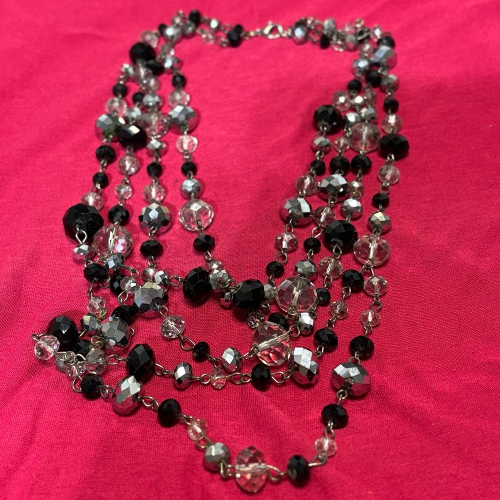 Beautiful black,silver, and clear crystal beaded multi strand necklace